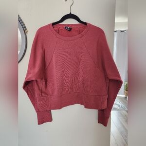 Nike Dri-FIT Embossed Logo Cropped Crewneck Sweatshirt